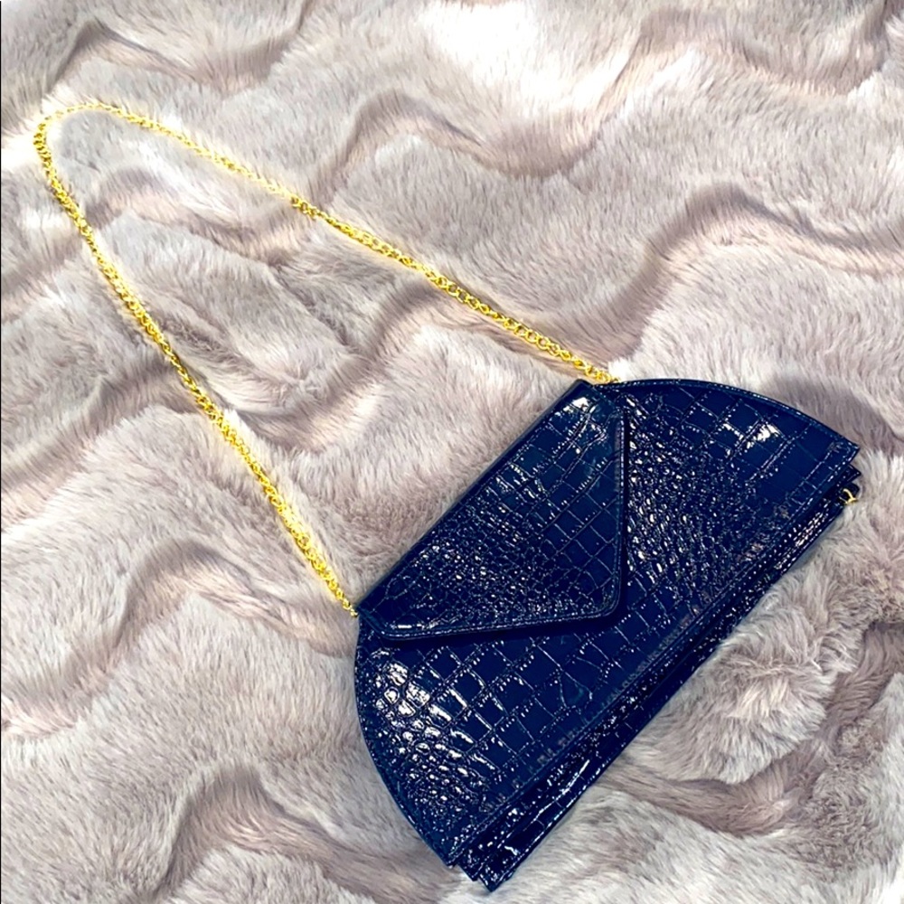 Joy & IMAN royal blue cross purse